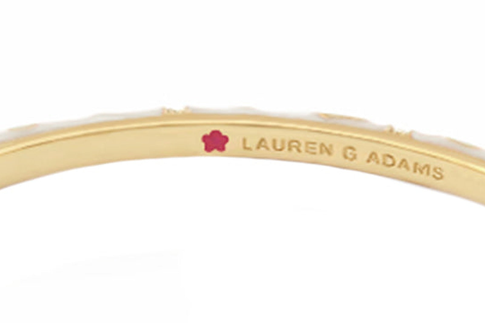 The plum-flower maker’s mark inside a bangle