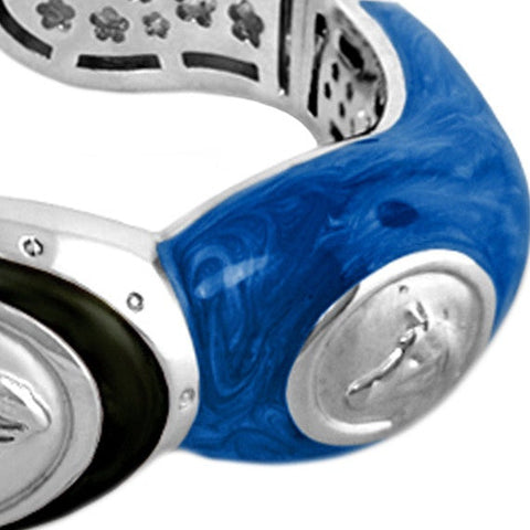 Blue marbled enamel with a silver horse medallion, magnified